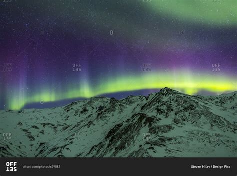 Aurora Borealis Over Mountains Within Denali National Park On A Very