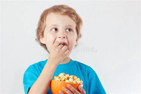 Little Boy Eating Popcorn Stock Image Image Of Showing 40377887