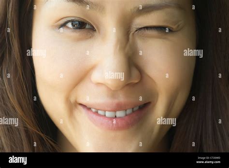 Asian Woman Winking Hi Res Stock Photography And Images Alamy