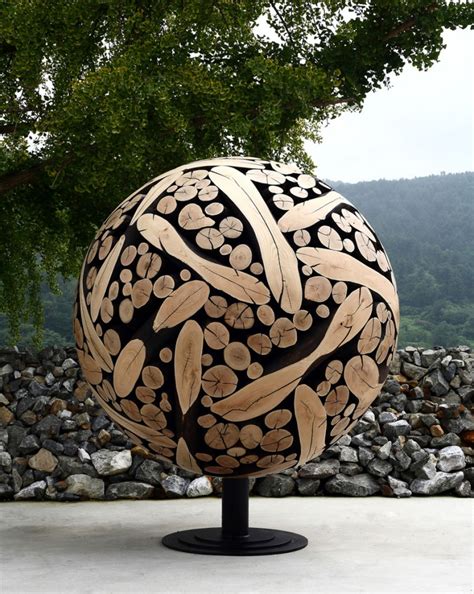 Wood Sculptures Created Out Of Discarded Tree Trunks And Branches