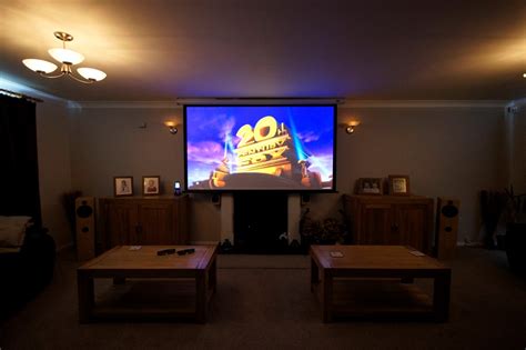 A basement home theater is an excellent idea because it is isolated and dark. Friendly home cinema lounge is ready for action - Inside CI