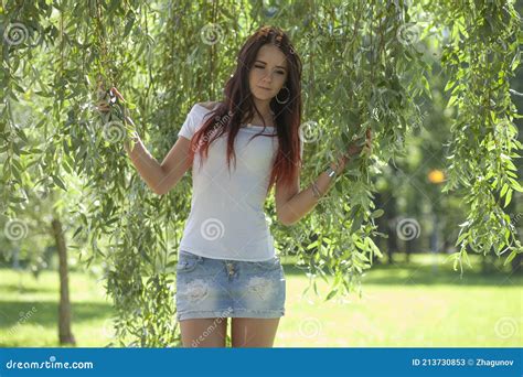 Erotic Girl With Mini Skirt On Green Grass Stock Image Image Of