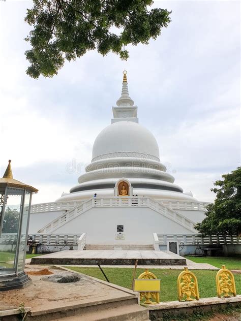 Beautiful Traditional Buddhist Temple With White Stupa On Sri Lanka