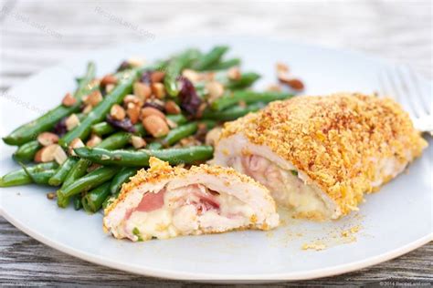Chicken stuffed with ham and cheese, coated with crunchy golden breadcrumbs. Oven Chicken Cordon Bleu Recipe