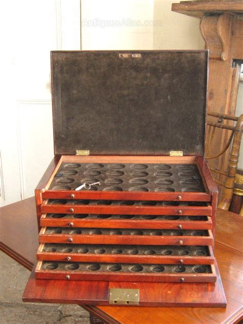 Maybe you would like to learn more about one of these? Mahogany Coin Collectors Cabinet - Antiques Atlas