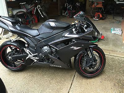 This version of the r1 recieved a few changes in 2006 including a longer wheelbase and a limited edition sp version was made available with ohlins suspension, marchesini wheels and a. Yamaha R1 Raven Edition Motorcycles for sale