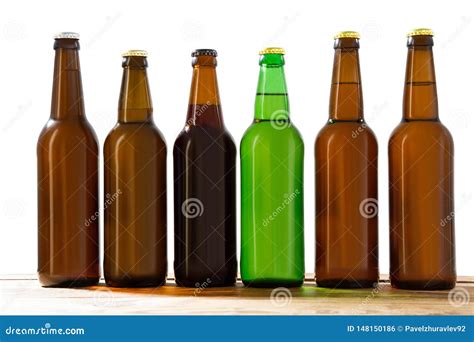 Photo Of Six Different Full Beer Bottles With No Labels Separate
