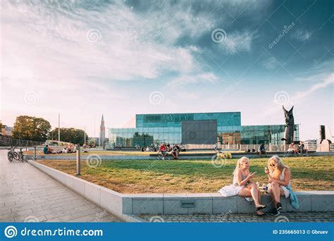 People Are Relaxing In Front Of The Kiasma Museum And Sanoma Building