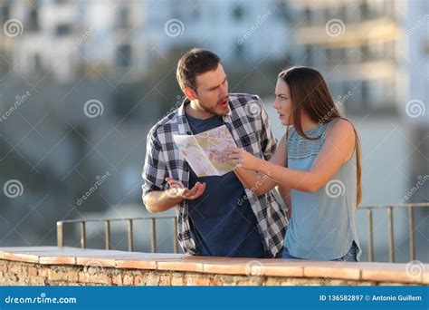 Couple Arguing About Travel Destination On Vacation Stock Image Image