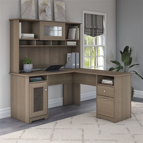 By sauder (3) $ 834 99. 60W L Shaped Computer Desk with Hutch in Ash Gray