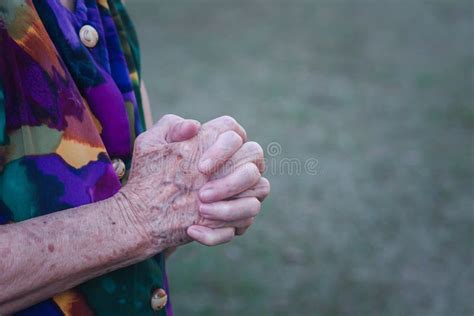 Close Up Of Senior Woman S Hands Joined Together For Praying While
