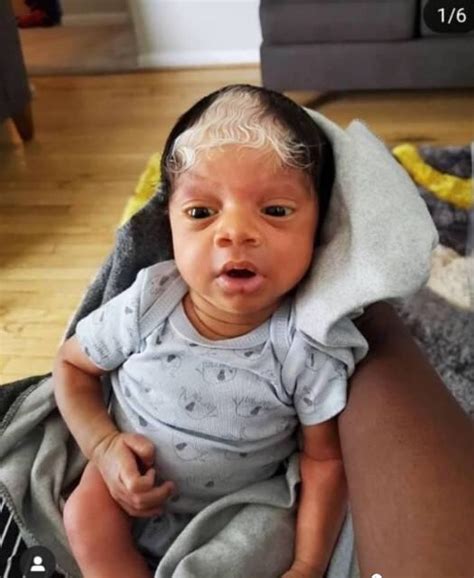 Meet The Cute Black Baby Born With Black And Grey Hair Photos