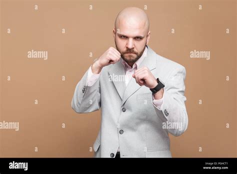 Portrait Of Serious Angry Handsome Middle Aged Bald Bearded Businessman
