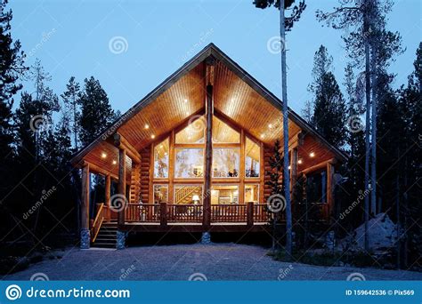 The Exterior Of A Modern Mountain Log Home Stock Photo
