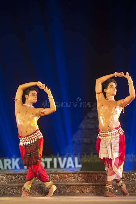 Two Male Odissi Dancer Performing Odissi Dance On Stage At Konark Dance