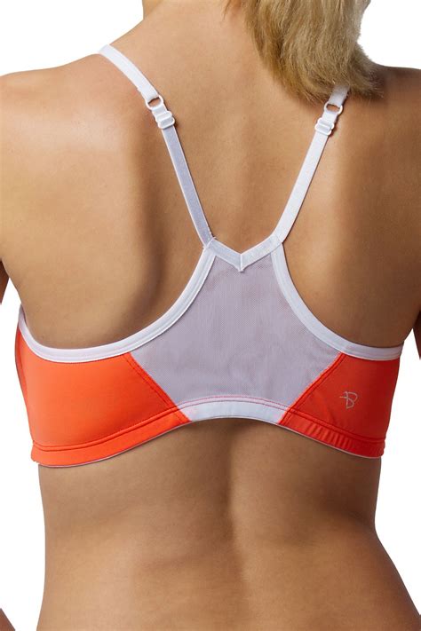 Check out our sports bra selection for the very best in unique or custom, handmade pieces from our sports & fitness shops. Push Up Sports Bra Orange Strappy - Products
