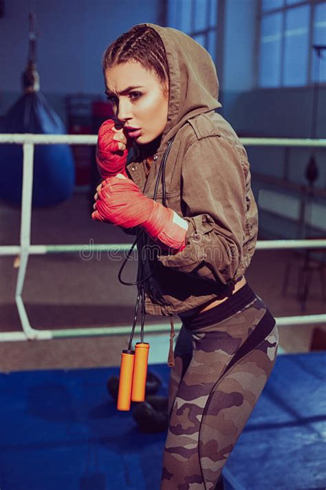 Young Female Boxer Ready To Fight In Old Leather Boxing Gloves Fitness
