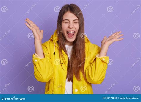 Emotional Young European Overjoyed Woman Raises Hands Shows Palms Feels Happiness Exclaims