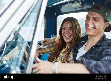 Model Released Young Couple In A Car Laughing Stock Photo Alamy