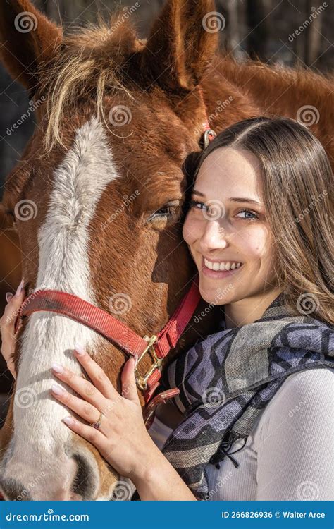 Lovely Brunette Cowgirl Enjoying A Day With Her Horse On Her Farm Stock