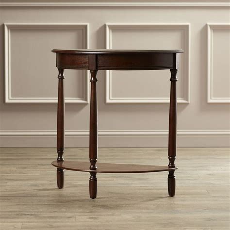 Looks aside, this table provides the perfect place to stage framed photos, potted plants, a collection of keys, and other entryway essentials. Look what I found on Wayfair! | Half moon console table ...