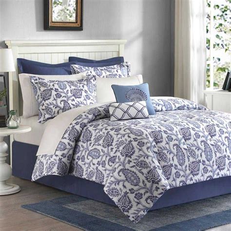 If you're going for a complete overhaul, add matching sheets, drapes and other accents. The Madison Park Nantucket Blue Queen Comforter Set ...