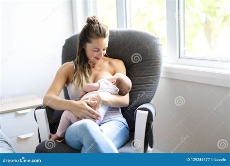 Cat Is Breastfeeding Her Baby Stock Photo Cartoondealer Com