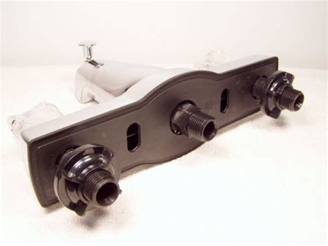 Before detaching any parts, shut off the water supply to the house to prevent the plumbing from spraying. Replacing Mobile Home 8" Bathtub Faucet - Mobile Home Repair