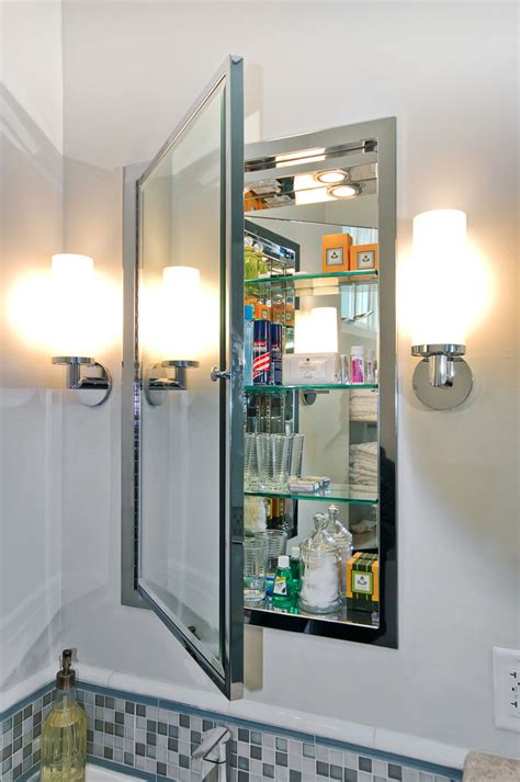 The cabinet's hinges are reversible to enable left or right. Cool recessed medicine cabinets in Bathroom Modern with ...