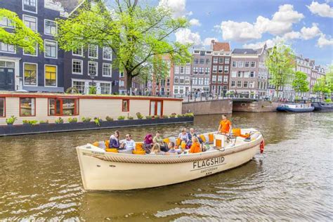 amsterdam open boat canal cruise with onboard bar getyourguide