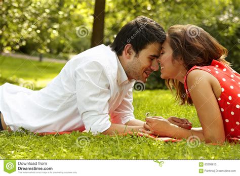 Couple In Love Lying On The Grass In The Park Stock Image Image Of Date Portrait 63206813
