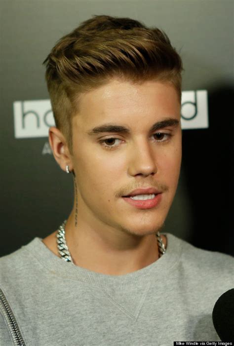 Justin bieber slicked back hair. Justin Bieber's Attempt At Facial Hair Is Creeping Us Out ...