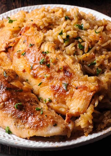 This chili garlic chicken is great over rice because the rice soaks up the sauce and juices, but you can also serve it on top of salad greens for a lighter option. Chicken with Garlic Parmesan Rice in 2020 (With images ...