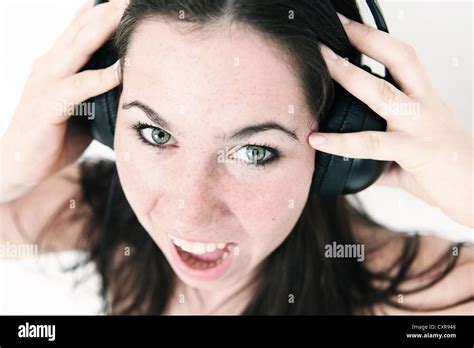 Young Woman Wearing Headphones Stock Photo Alamy