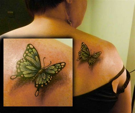 Https://tommynaija.com/tattoo/butterfly Landing Tattoo Designs
