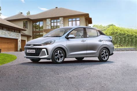 Hyundai Aura Sx Cng On Road Price Aura Sx Cng Images Colour And Mileage