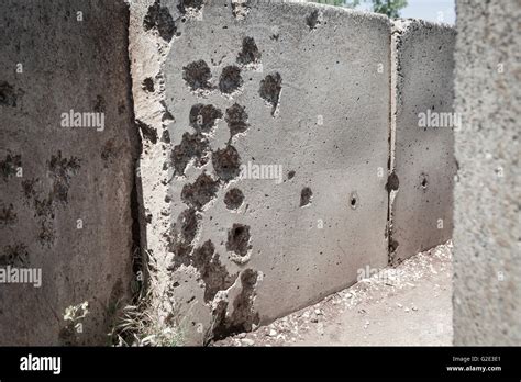 Concrete Wall Full With Old War Bullet Holes Stock Photo Alamy