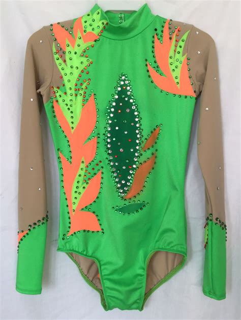 A Long Sleeved Leotard With Green And Orange Flowers On The Back
