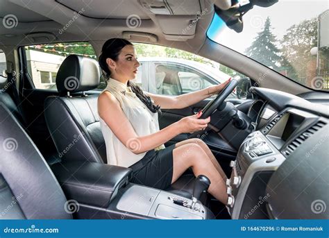 Beautiful Woman Sitting In Driver Seat Inside Car Stock Photo Image