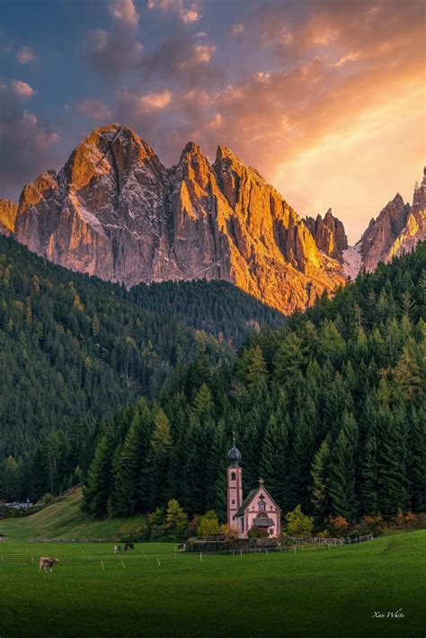 Dolomites Looming Over San Giovanni Church In Val Di Funes Italia