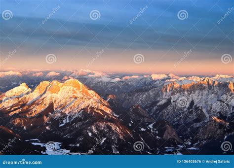Aerial View Of Alpine Peaks Over Austria In Sunset Stock Photo Image