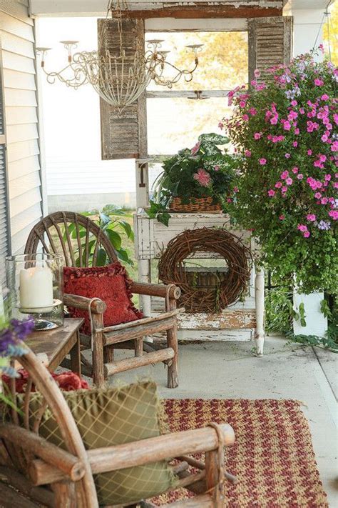 Although, rustic farmhouse décor is big on wooden items when it comes to using rocking chairs as part of your porch décor you want to go with a neutral color such as what of these rustic farmhouse décor options for your porch is your personal favorite? Flea Market Style Farmhouse Porch | Porch decorating, Shabby chic porch, Porch patio