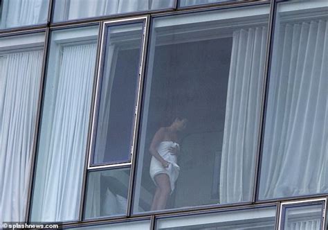 couple are caught cavorting nyc hotel window as in room photographer captures porn shoot on