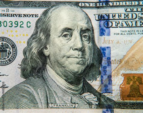 Portrait Of Benjamin Franklin On United States 100 Dollar Bill Stock