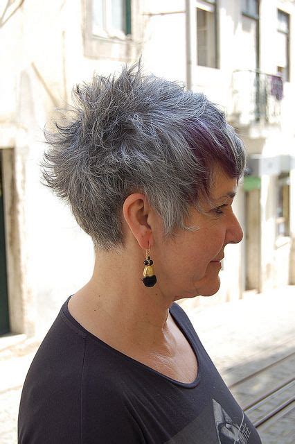 Learn all there is to know about short haircuts for straight hair and the very many ways you can style this highly adaptive cut. short with a dash of purple | Purple grey hair, Grey hair ...