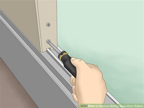 Carefully lift the door up until it's free from the tracks and then have your partner help you tilt it slightly to remove the door from the upper track. 3 Ways to Replace Sliding Glass Door Rollers - wikiHow