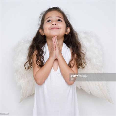 Angel Girl Praying High Res Stock Photo Getty Images