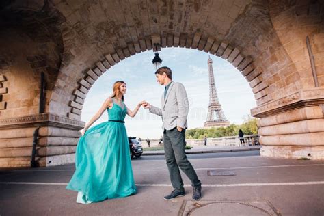 A Romantic Couple Of Lovers Meet Near The Eiffel Towerparis France
