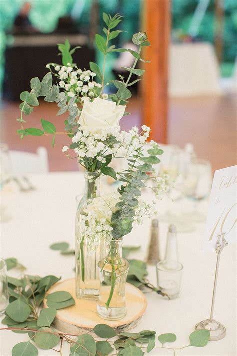 Simple Green And White Flower Centerpiece Birch Wood Slab Base Clear