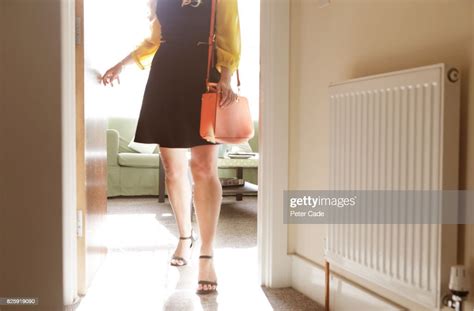 Woman Walking Out Of Room Ready To Leave House Photo Getty Images